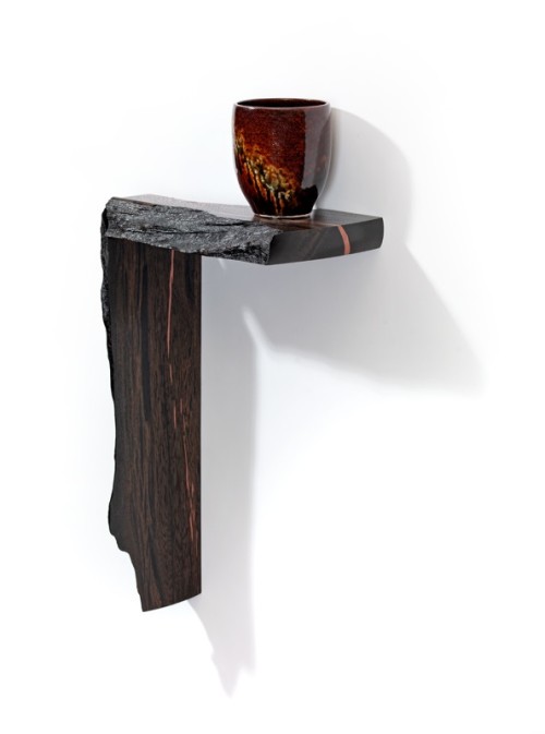 shelf from 3500 year old bog oak, with copper inlay