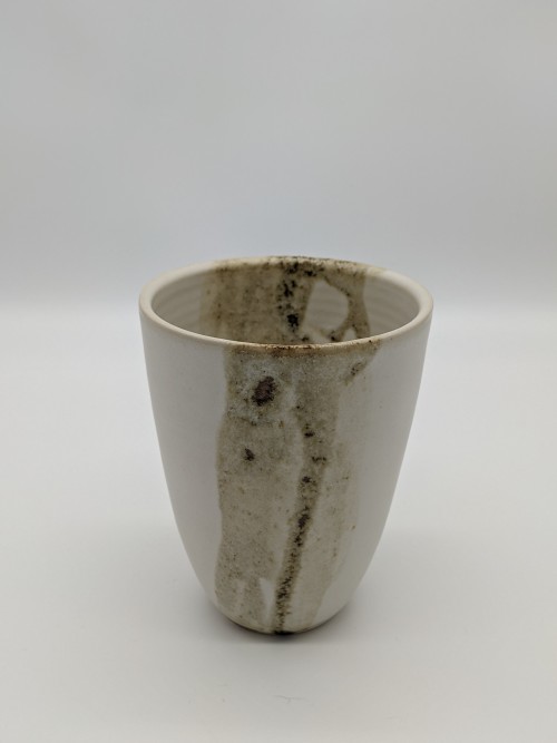 Wheel thrown vessel with 