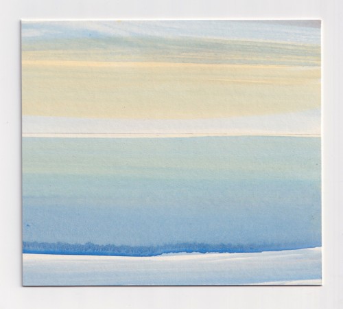 A line of of sea, of sky, of sand