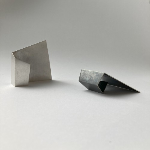 Fold rings, sterling silver and patina 